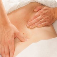 19040561 - a physio gives myotherapy using trigger points on athlete woman 19040561 - a physio gives myotherapy using trigger points on athlete woman